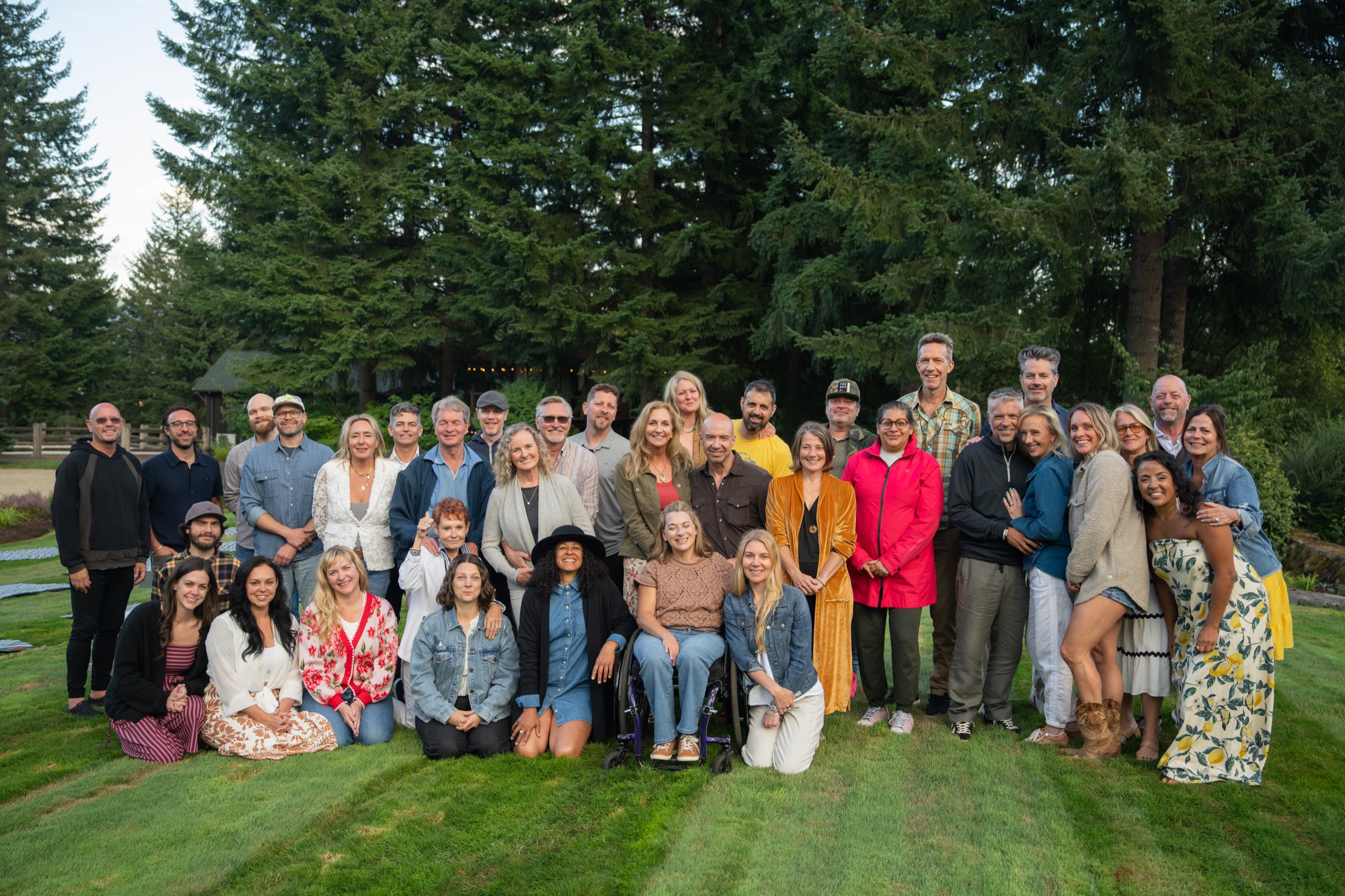 The guests of The Space Between gathered together on the lawn