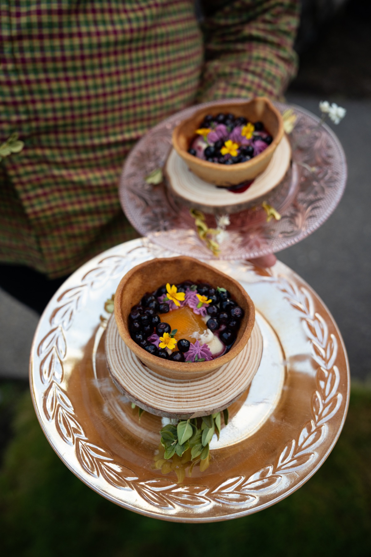 Seasonal berry desserts finished with edible flowers